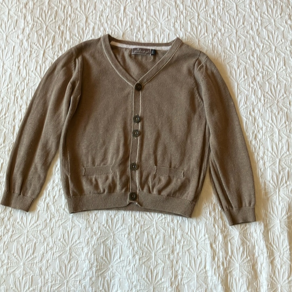 Brown cardigan by French designer jeanbourget. Buttons down front